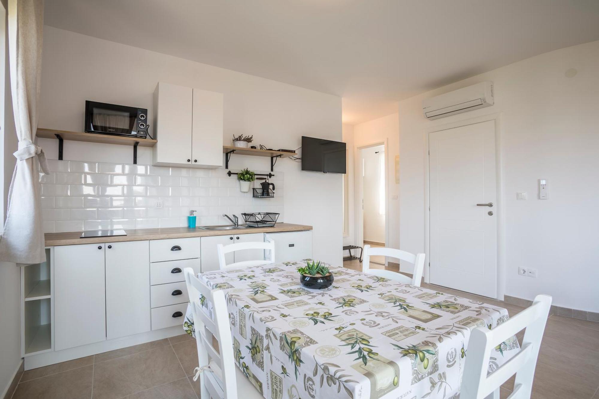 Apartmani Mariela Maslinica Ruang foto